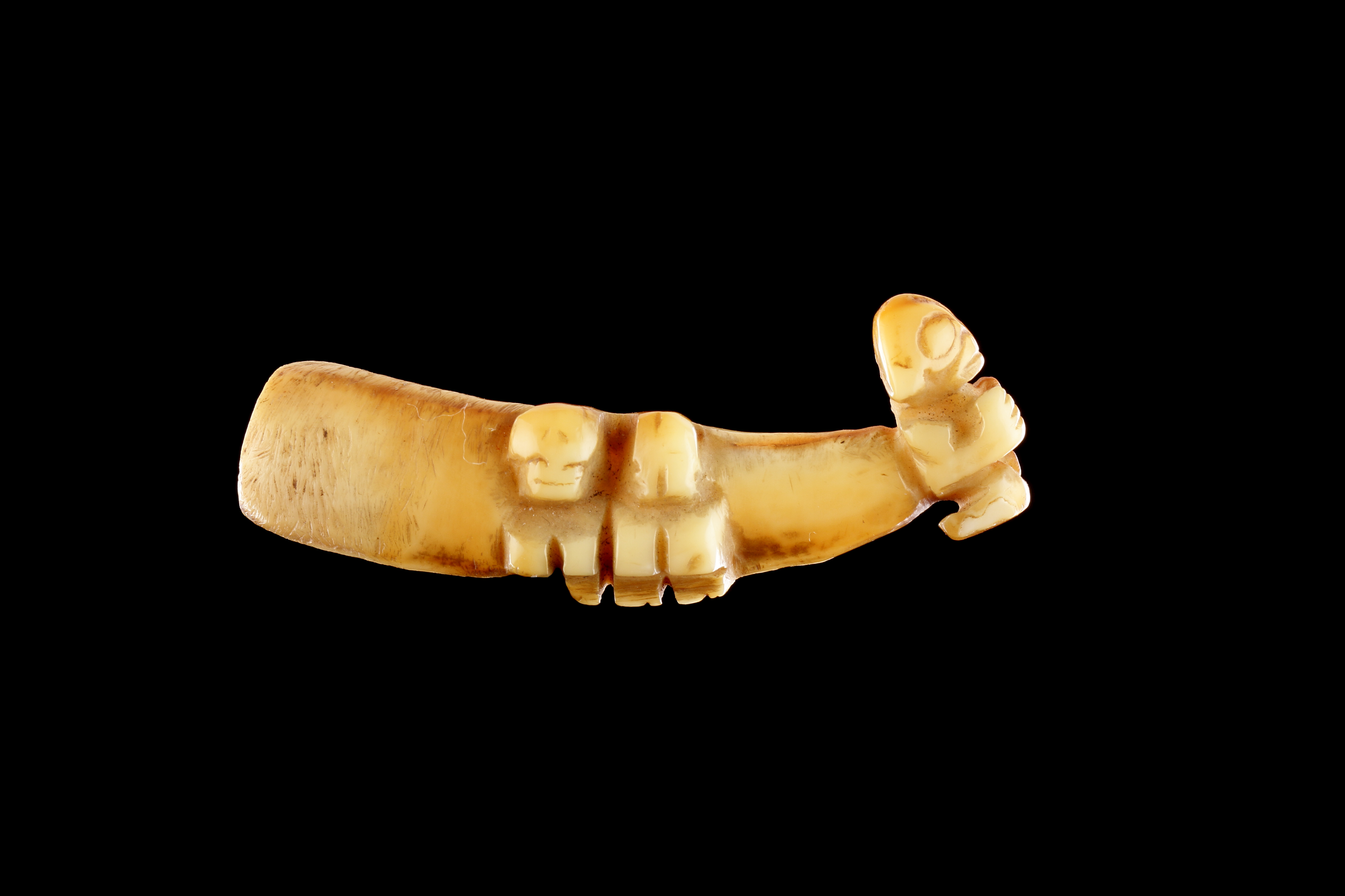 Fine Marquesas Islands Boars-Tusk / Tooth Ear Pendant ‘Ha‘akai’ with Three Tiki Figures 